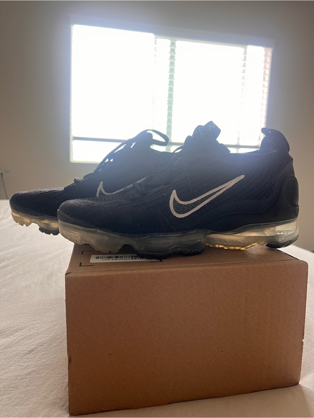 Nike Men’s Black and White VaporMax Air Cushion Sneakers